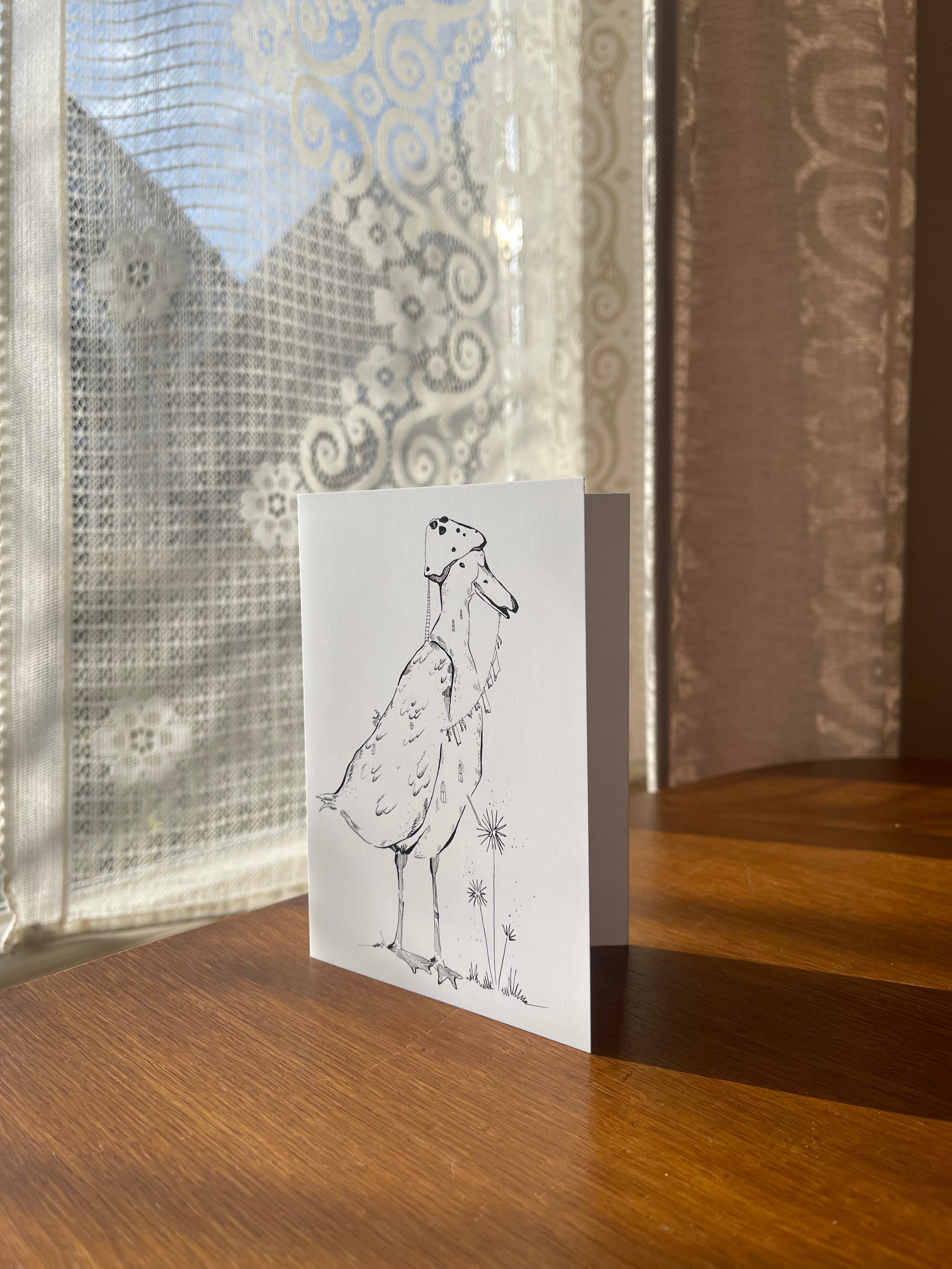 eend met een paddenstoelenhoed